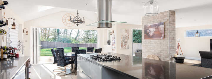 open plan kitchen and dining area with the view outside