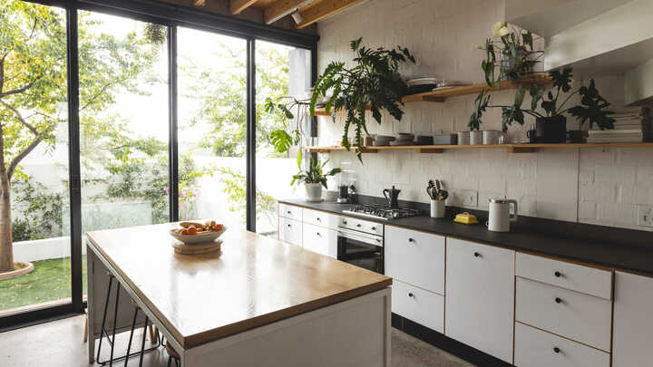 small open plan kitchen with view to garden